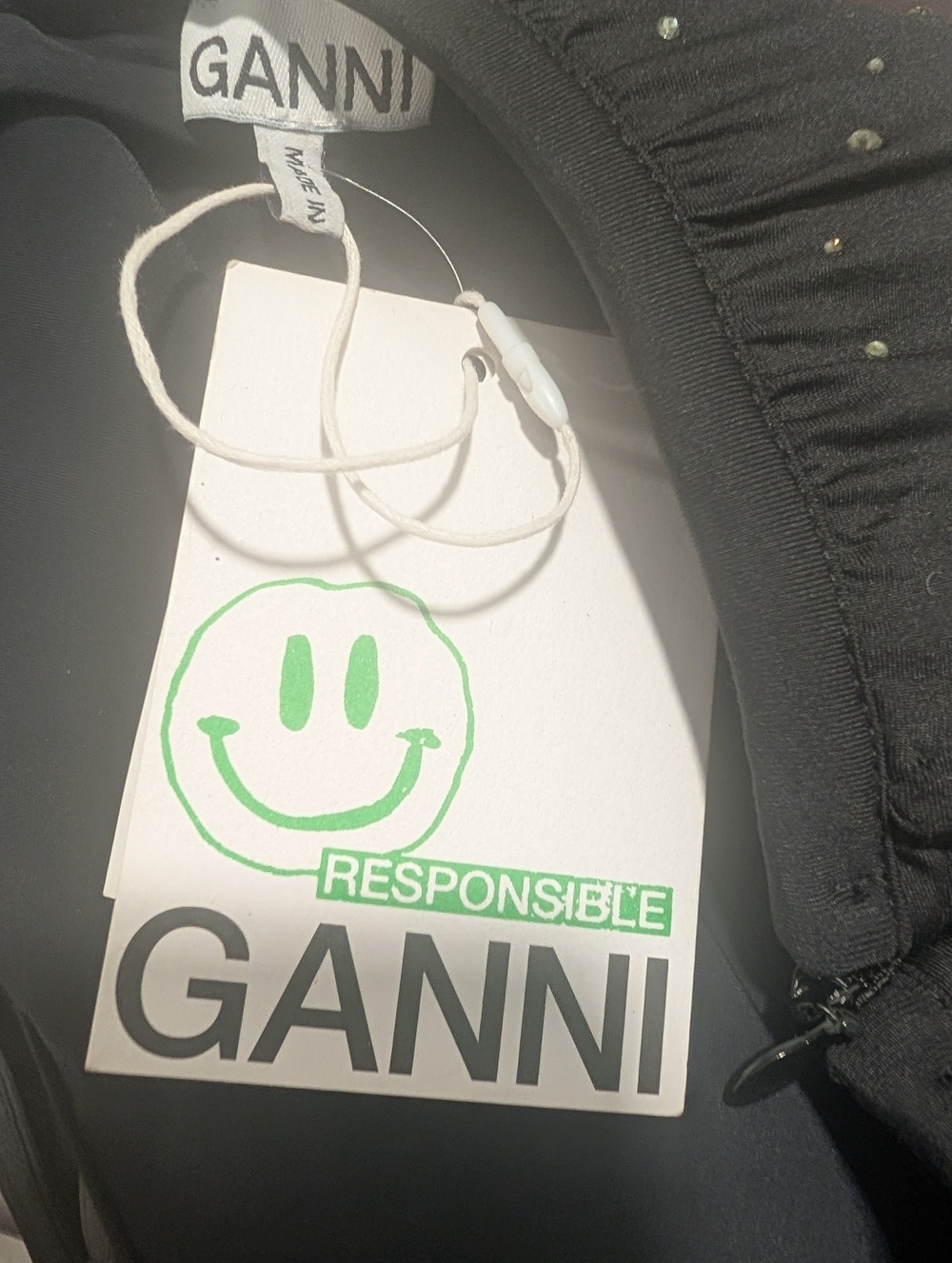 GANNI | Ruffled Rhinestone One-Shoulder Bodysuit In Black - Picture 5 of 11